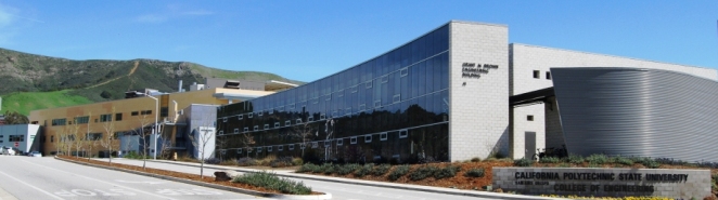 Photo of entrance to Cal Poly State University via Highway 1.  Grant M. Brown building in foreground with Engineering IV building in the distance. Photo by Cheryl May, Analyst, Human Resources.